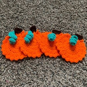Handmade. Crochet coaster pumpkin.